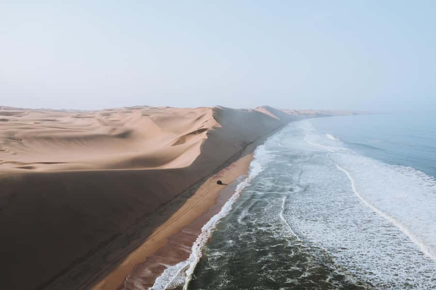From Walvis Bay: Sandwich Harbor 4x4 Tour - Walvis Bay Lagoon and its flamingos