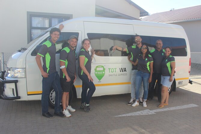 Private Transfers between Windhoek and Hosea Kutako Int. Airport - Arriving at Hosea Kutako with a name board