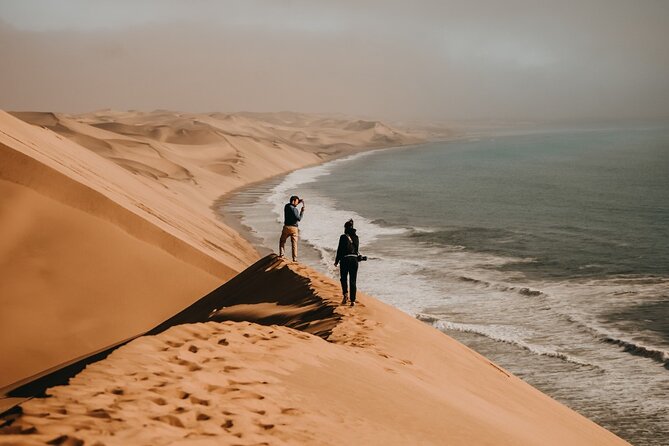 Sandwich Harbour 4x4 Guided Tour - Unforgettable Adventure - Walvis Bay Esplanade adds salt lakes and open views