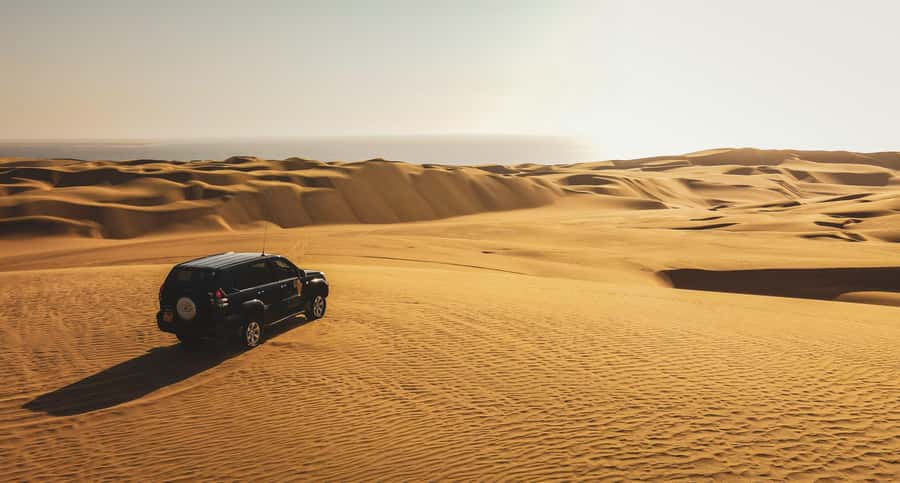Walvisbay: Sandwich Harbour SUNSET Tour-End It Beautifully - Sunset from a high dune